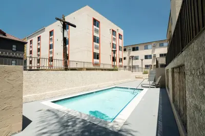 an empty swimming pool in front of a building at Hollywood 1BR w pool nr Griffith Park trails LAX-117 in Los Angeles