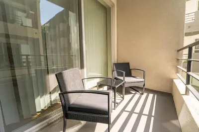 two chairs and a table on a balcony at 2 bed in Marina Del Rey- Flash holiday deal! in Los Angeles