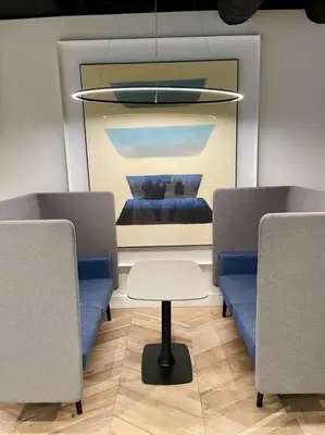 a room with two chairs and a table and a painting at 1 bedroom. 2 beds. 1 bath with Balcony in Los Angeles