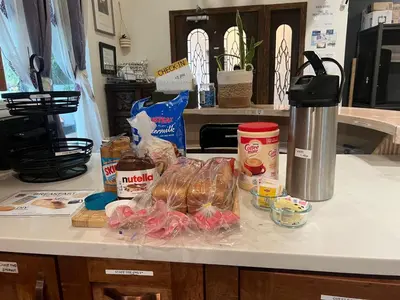a kitchen counter with a bunch of food on it at Rumi in Los Angeles