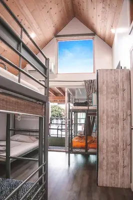 a room with bunk beds and a window at Rumi in Los Angeles
