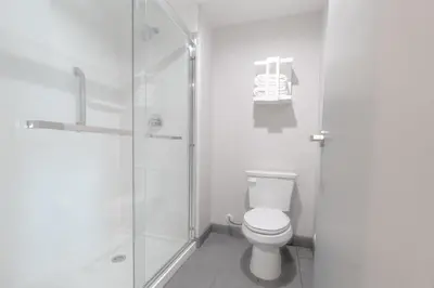 a bathroom with a toilet and a glass shower at Hampton Inn By Hilton Santa Clarita-Valencia in Santa Clarita