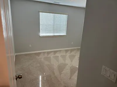 a white room with a window and a door at ALE Displaced, Relocation, Insurance, Fire, Flood in Corona