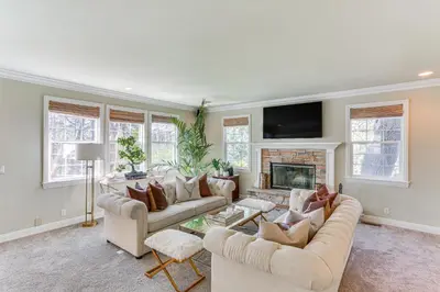 a living room with two couches and a fireplace at Lake Arrowhead Home Mountain View, Walk to Water! in Lake Arrowhead