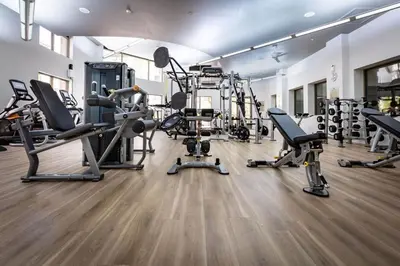 a gym with several treadmills and cardio machines at Woodland Hills Luxury Apt 2 bed CA in Los Angeles