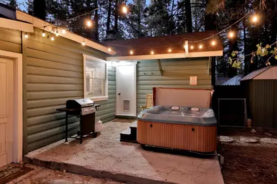 a sauna with a hot tub and a grill at Cozy fox #2035 in Big Bear Lake