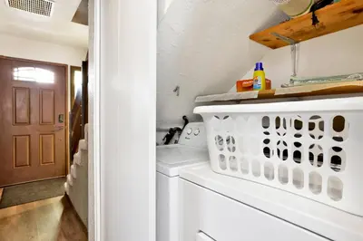 a laundry room with a washer and dryer at Smith summit chalet #2461 in Big Bear Lake