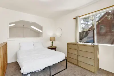 a bedroom with a bed and a window at Life of riley #1608 in Big Bear Lake
