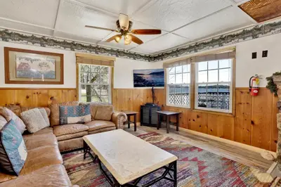 a living room with a couch and a ceiling fan at FRANK'S OLD BEAR #149 in Big Bear Lake