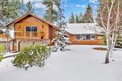 a log home in the snow at All about fun #1149 in Big Bear Lake