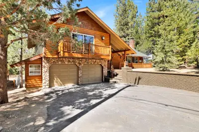 a house with a garage in front of it at All about fun #1149 in Big Bear Lake