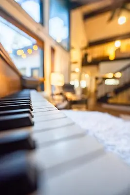 a close up of a piano keyboard in a room at Soaring pines #2193 in Big Bear Lake