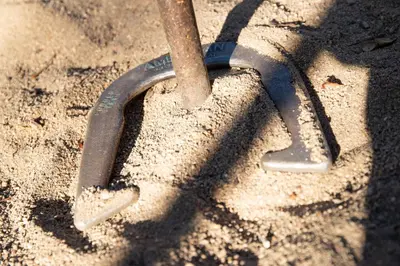 a pair of golf clubs in the sand at Big pines #103 in Big Bear Lake
