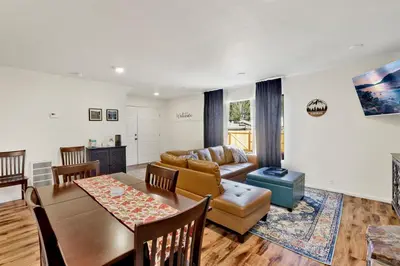 a living room with a couch and a table at The weekender #2342 in Big Bear City
