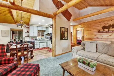 a living room with a couch and a table at Timber pines chalet #2417 in Big Bear Lake
