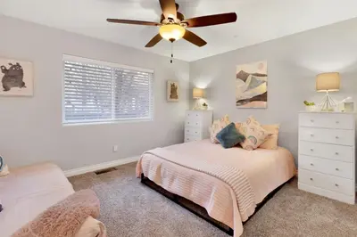 a bedroom with a bed and a ceiling fan at Majestic sky retreat #2090 in Big Bear Lake