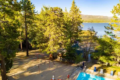 an aerial view of a playground next to a lake at Lakefront #110 in Big Bear Lake