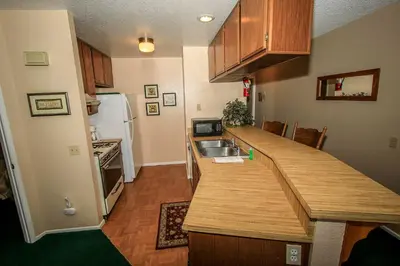 a kitchen with a sink and a counter top at Boulder creek #1412 in Big Bear Lake