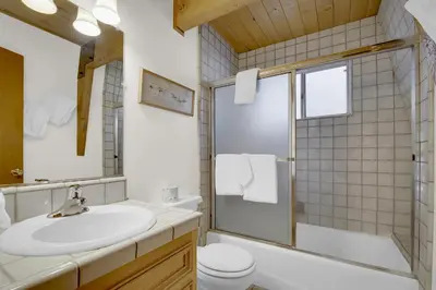 a bathroom with a sink and a shower at Switzerland ski chalet #845 in Big Bear Lake