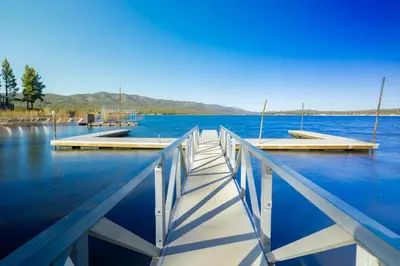 a dock in the middle of a large body of water at Lodge house #100 in Big Bear Lake