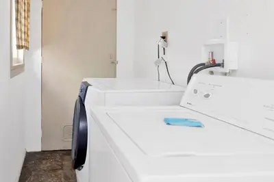 a white washer and dryer in a room at Lodge house #100 in Big Bear Lake