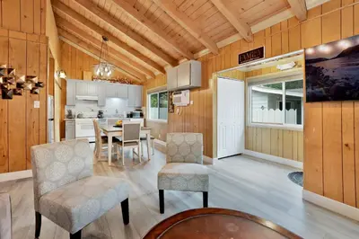 a kitchen and dining room with a table and chairs at Sweet retreat 1 #2332 in Big Bear Lake