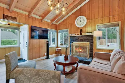 a living room with a couch and a fireplace at Sweet retreat 1 #2332 in Big Bear Lake