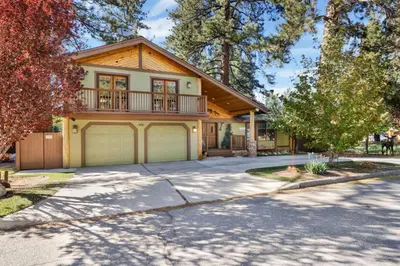 a house with a balcony and a garage at Moose manor #2012 in Big Bear Lake