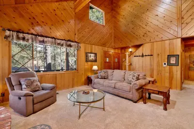a living room with a couch and a coffee table at Moose creek chalet #1237 in Big Bear Lake