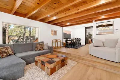 a living room with a couch and a table at Vista pines #234 in Big Bear Lake