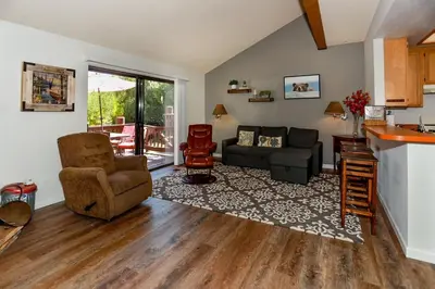 a living room with a couch and a table at Cienega getaway #1952 in Big Bear Lake