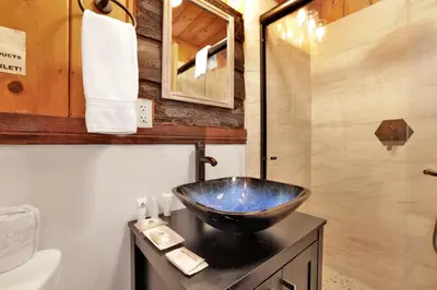 a bathroom with a bowl sink on a counter at Shore acres lodge #450 in Big Bear Lake