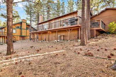an exterior view of a house with trees at Mockingbird mountain getaway #2380 in Big Bear Lake