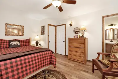 a bedroom with a bed and a ceiling fan at Mockingbird mountain getaway #2380 in Big Bear Lake
