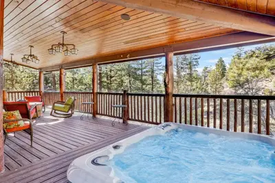 a hot tub on the deck of a cabin at Gold rush lodge #2352 in Big Bear Lake