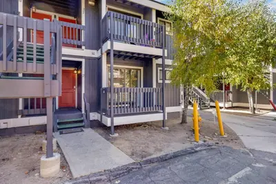 a apartment building with a fire hydrant in front of it at Blue jay getaway #2082 in Big Bear Lake