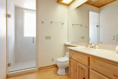 a bathroom with a toilet and a sink and a shower at Starlight vistas #1524 in Big Bear Lake
