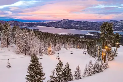 a ski resort with a ski lift in the snow at Crestwood summit #2119 in Big Bear Lake