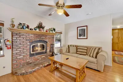 a living room with a couch and a fireplace at Crestwood summit #2119 in Big Bear Lake