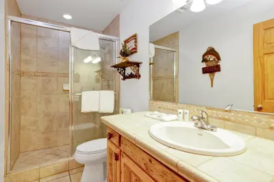 a bathroom with a sink and a shower and a toilet at Fishermans paradise #1792 in Big Bear Lake