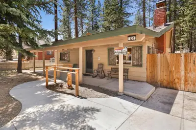 a small house with a fire hydrant in front of it at Oriole cottage #621 in Big Bear Lake