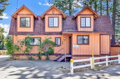 a house with a fence in front of it at Breezy two #113 in Big Bear Lake