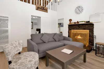 a living room with a couch and a fireplace at Sweet retreat 2 #2333 in Big Bear Lake