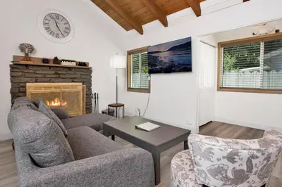 a living room with a couch and a fireplace at Sweet retreat 2 #2333 in Big Bear Lake