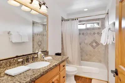 a bathroom with a sink and a shower at Cozy lakeview hideaway #2261 in Fawnskin