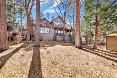 a large house with trees in front of it at Splash mountain #1904 in Big Bear Lake