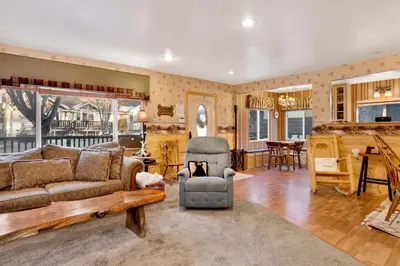 a living room with a couch and a chair at Big bear happy place #2421 in Big Bear Lake