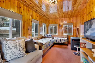 a living room with a couch and a tv at Big bear happy place #2421 in Big Bear Lake