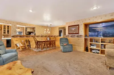 a living room with a couch and a table at Big bear happy place #2421 in Big Bear Lake