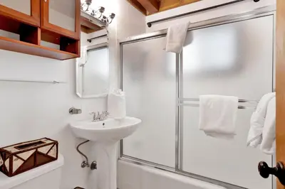 a bathroom with a shower and a sink at Kozy cabin #2386 in Big Bear Lake